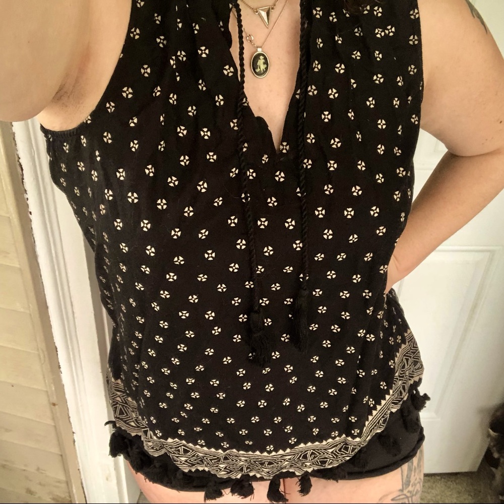 black and cream tank with tassels